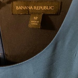 Blue, Black and White midi length pleated skirt great for work.